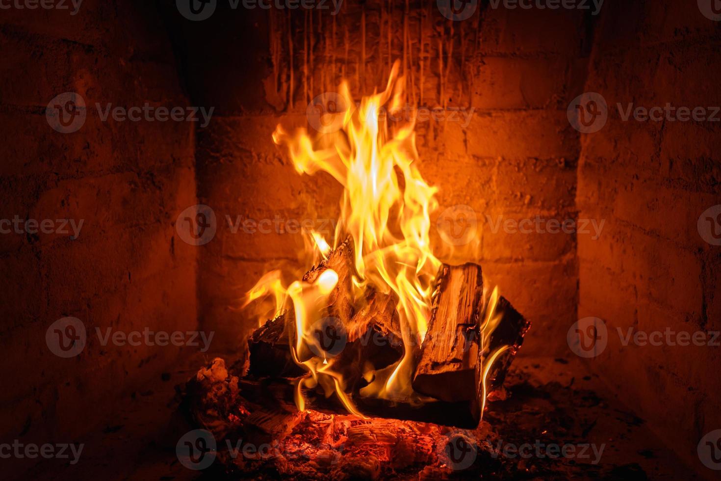 Fire flames in fireplace background photo