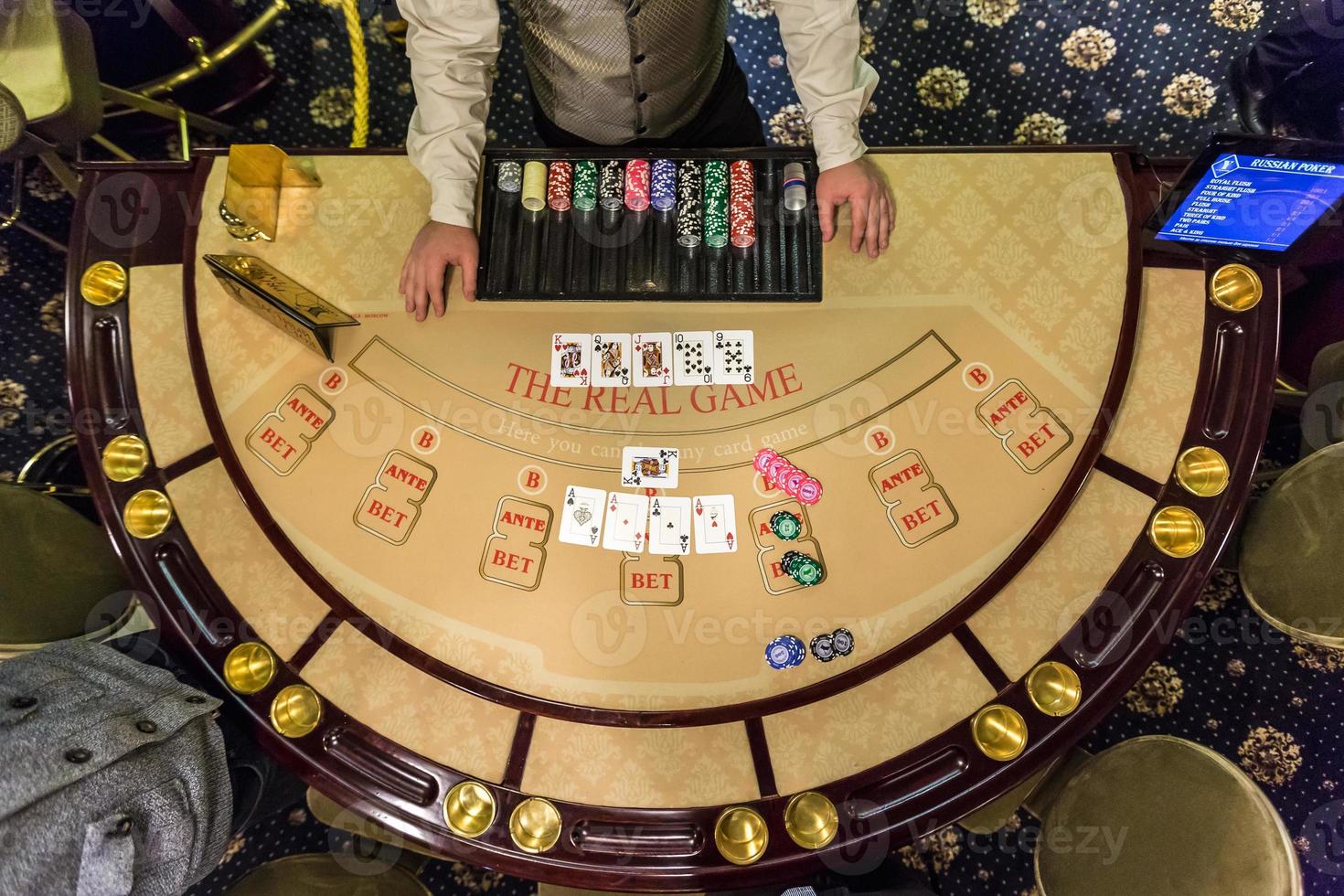 gambling chips and cards on a game table roulette photo