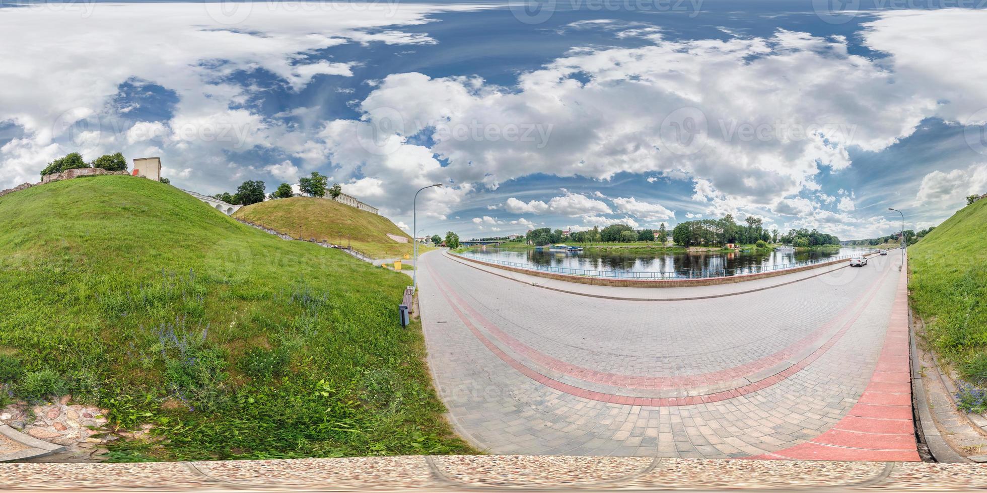 full 360 degree panorama in equirectangular spherical projection old medieval ruined castle on the mountain near the modern river bank, VR content photo