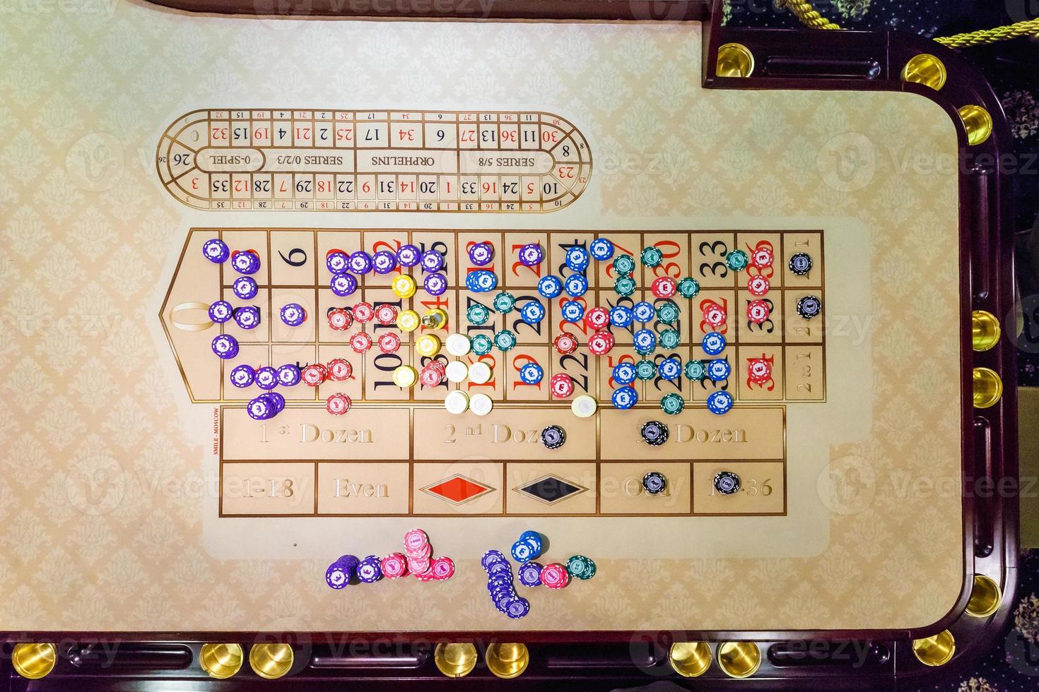 gambling chips on a game table roulette photo