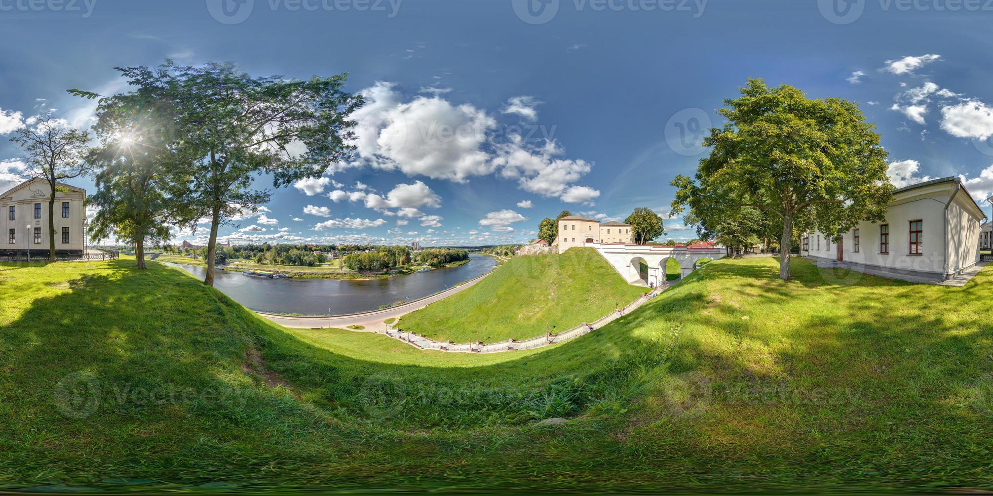 Full 360 degree panorama in equirectangular equidistant spherical projection on the ruins of an ancient medieval castle over the river neman in sunny day photo