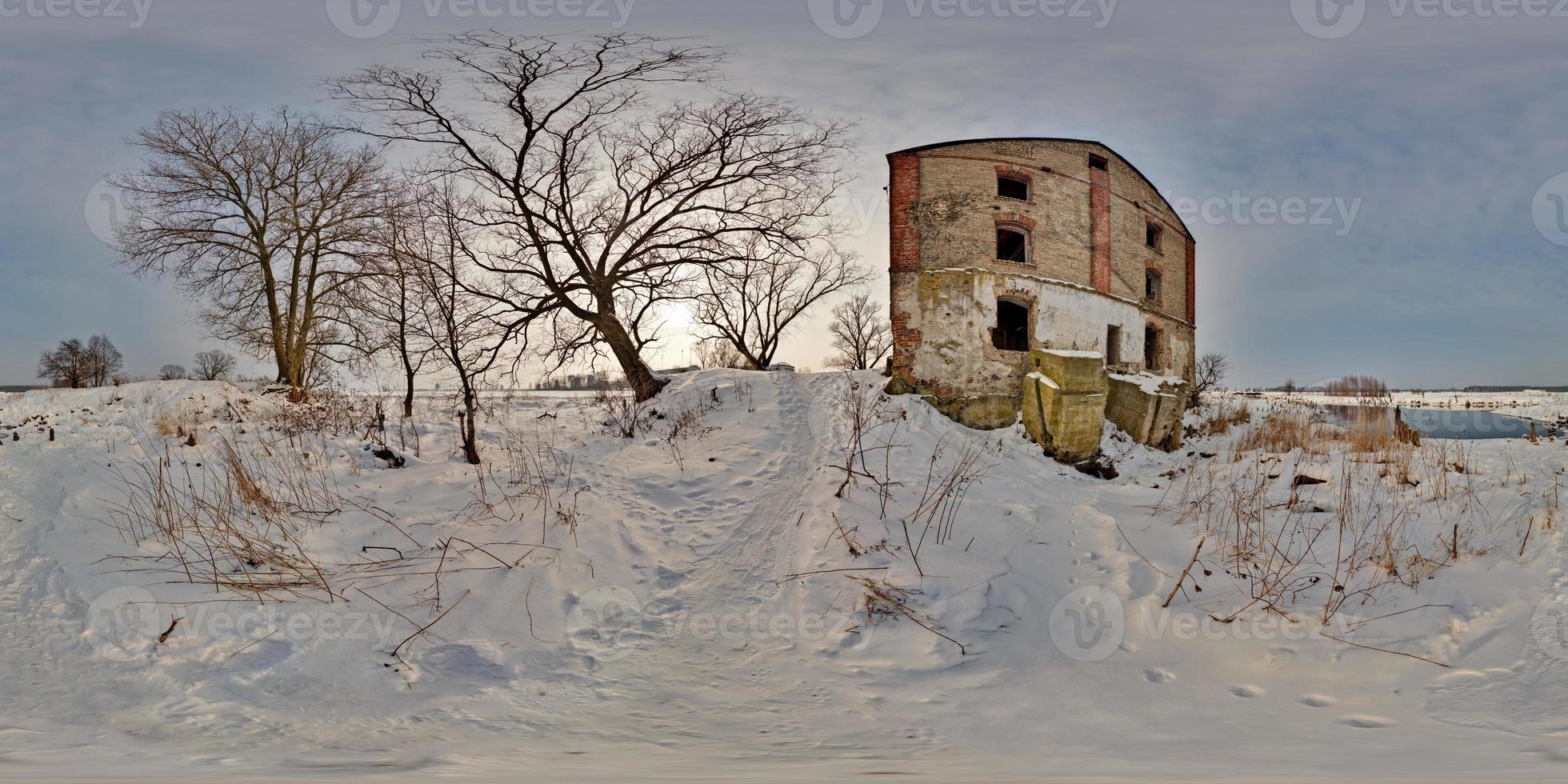 full 360 degree panorama in equirectangular spherical projection old abandoned medieval mill in winter, VR content photo