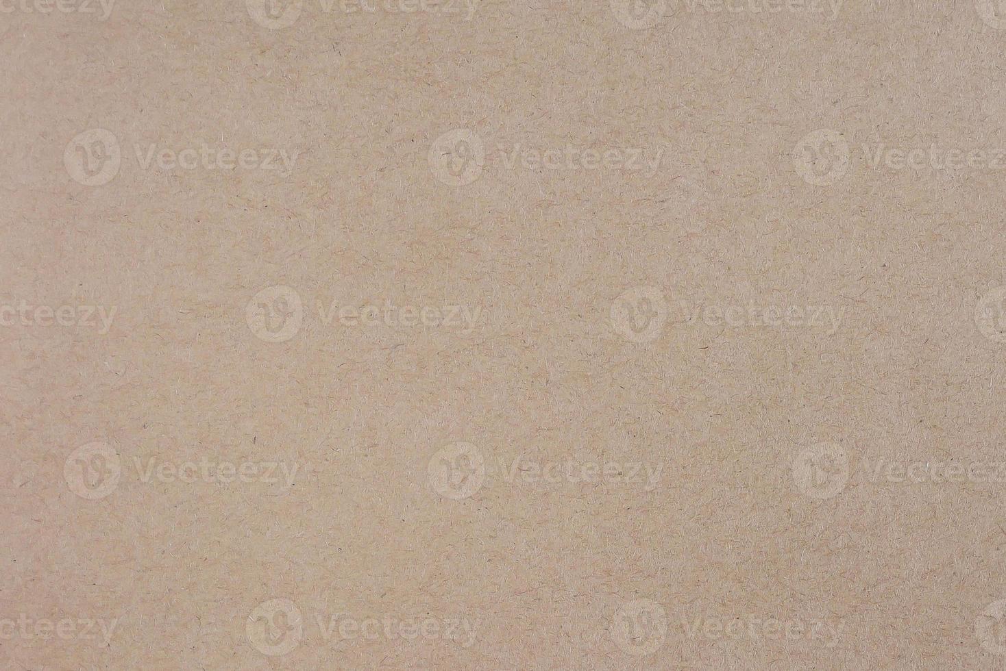 primer plano de la parte delantera de madera contrachapada marrón. papel reciclado, madera contrachapada de tablero de compresión, textura granulada de madera de compresión parcial, plantilla de sitio web foto