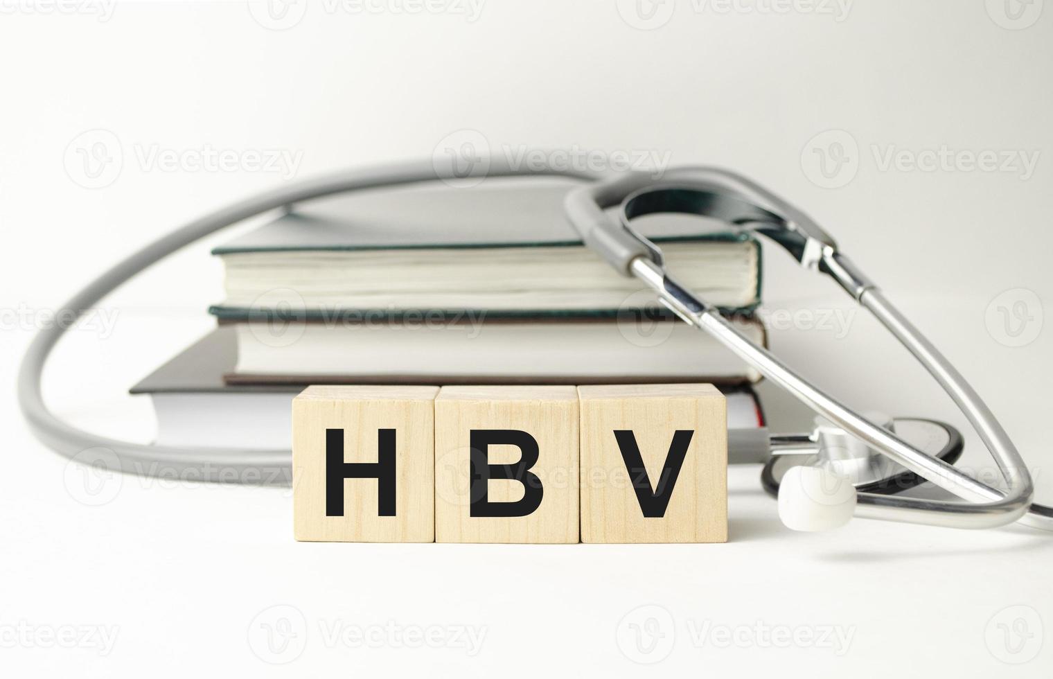 word HBV on wooden blocks. medical concept . the medicine photo