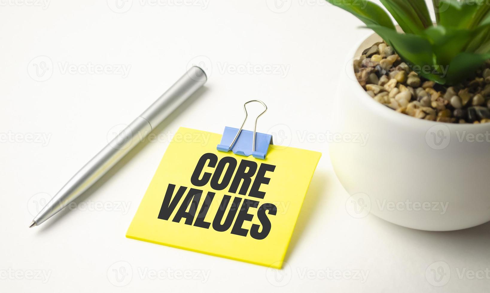 yellow sticker with the text core values and charts photo