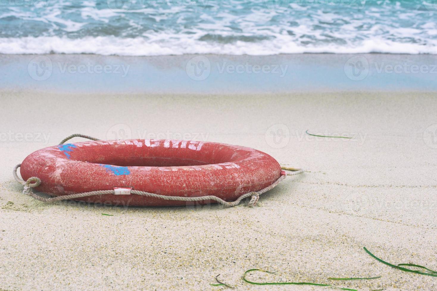 Lifebuoy on the beach photo