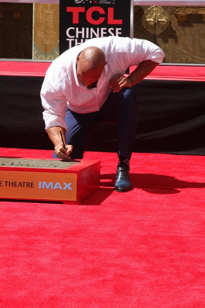 LOS ANGELES, MAY 19 - Dwayne Johnson, The Rock at the Dwayne Johnson Hand and Foot Print Ceremony at the TCL Chinese Theater on May 19, 2015 in Los Angeles, CA photo
