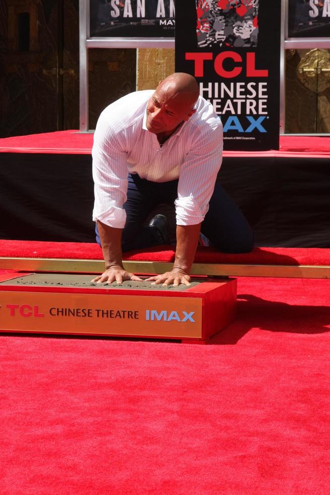LOS ANGELES, MAY 19 - Dwayne Johnson, The Rock at the Dwayne Johnson Hand and Foot Print Ceremony at the TCL Chinese Theater on May 19, 2015 in Los Angeles, CA photo