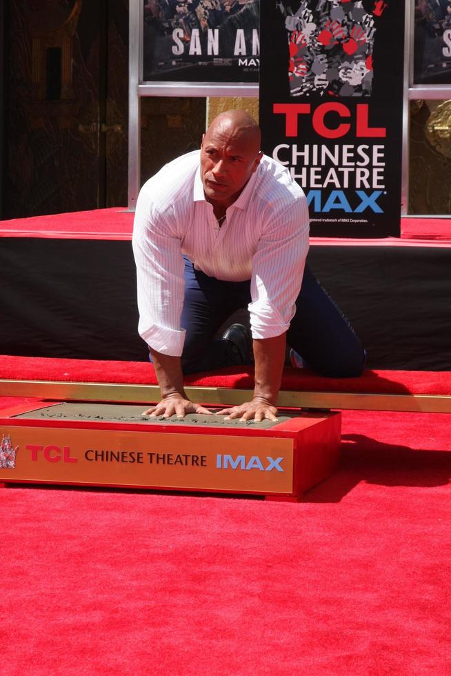 LOS ANGELES, MAY 19 - Dwayne Johnson, The Rock at the Dwayne Johnson Hand and Foot Print Ceremony at the TCL Chinese Theater on May 19, 2015 in Los Angeles, CA photo