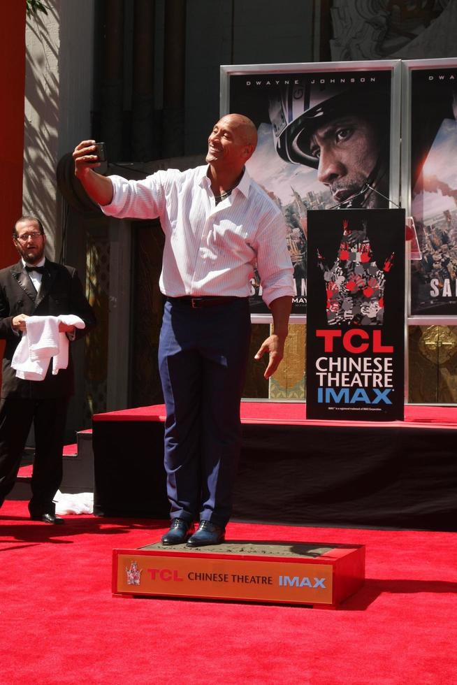 LOS ANGELES, MAY 19 - Dwayne Johnson, The Rock at the Dwayne Johnson Hand and Foot Print Ceremony at the TCL Chinese Theater on May 19, 2015 in Los Angeles, CA photo