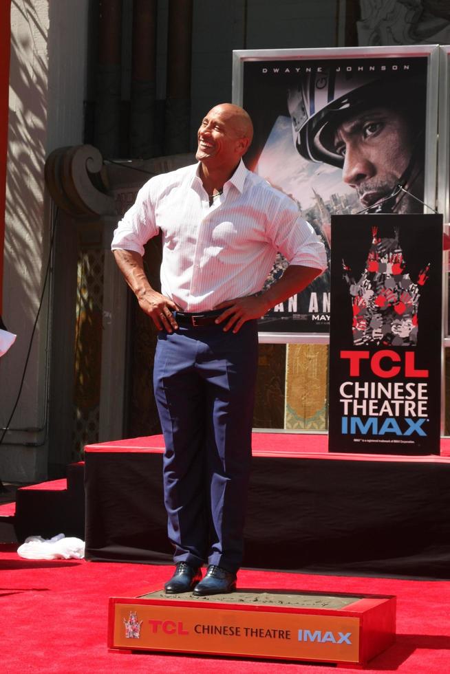 LOS ANGELES, MAY 19 - Dwayne Johnson, The Rock at the Dwayne Johnson Hand and Foot Print Ceremony at the TCL Chinese Theater on May 19, 2015 in Los Angeles, CA photo