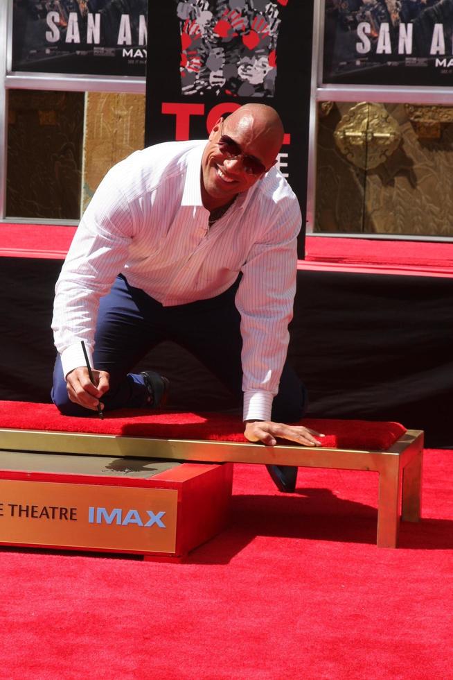 LOS ANGELES, MAY 19 - Dwayne Johnson, The Rock at the Dwayne Johnson Hand and Foot Print Ceremony at the TCL Chinese Theater on May 19, 2015 in Los Angeles, CA photo