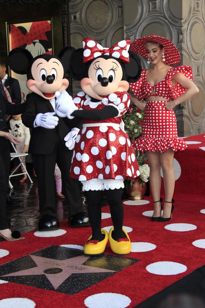 LOS ANGELES   JAN 22 - Mickey Mouse, Katy Perry, Minnie Mouse at the Minnie Mouse Star Ceremony on the Hollywood Walk of Fame on January 22, 2018 in Hollywood, CA photo