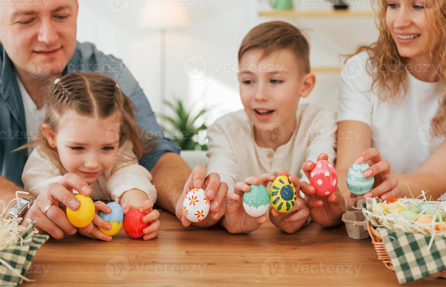 Happy family celebrating Easter holidays together photo