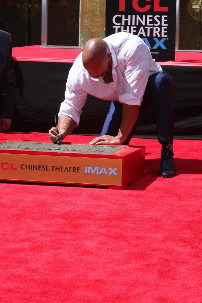 LOS ANGELES, MAY 19 - Dwayne Johnson, The Rock at the Dwayne Johnson Hand and Foot Print Ceremony at the TCL Chinese Theater on May 19, 2015 in Los Angeles, CA photo