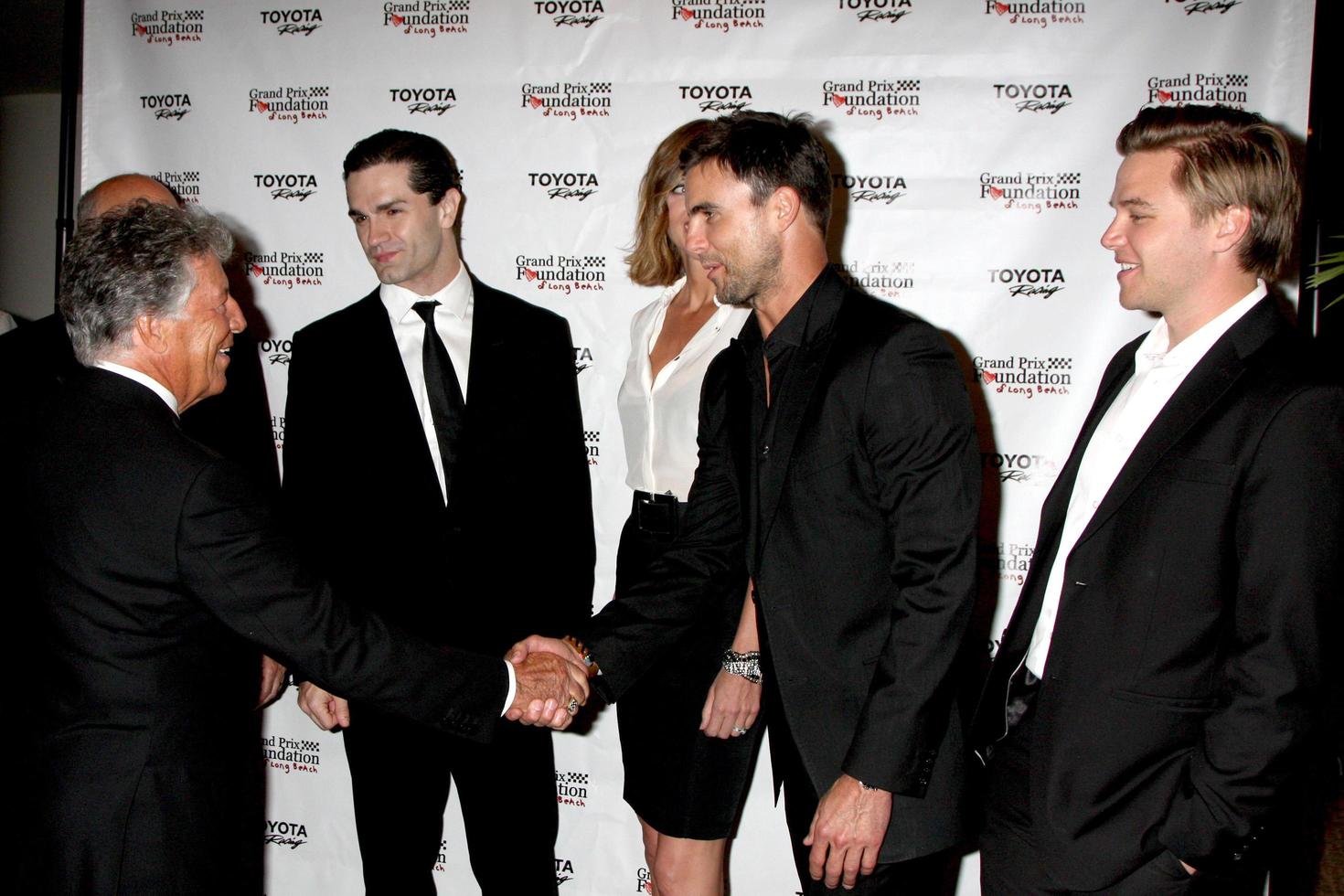 LOS ANGELES  APR 11 - Mario Andretti, Sam Witwer, Tricia Helfer, Colin Egglesfield, Brett Davern at the Long Beach Grand Prix Foundation Gala at Westin Hotel on April 11, 2014 in Long Beach, CA photo