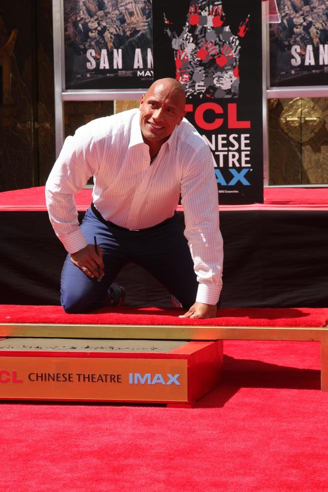 LOS ANGELES, MAY 19 - Dwayne Johnson, The Rock at the Dwayne Johnson Hand and Foot Print Ceremony at the TCL Chinese Theater on May 19, 2015 in Los Angeles, CA photo