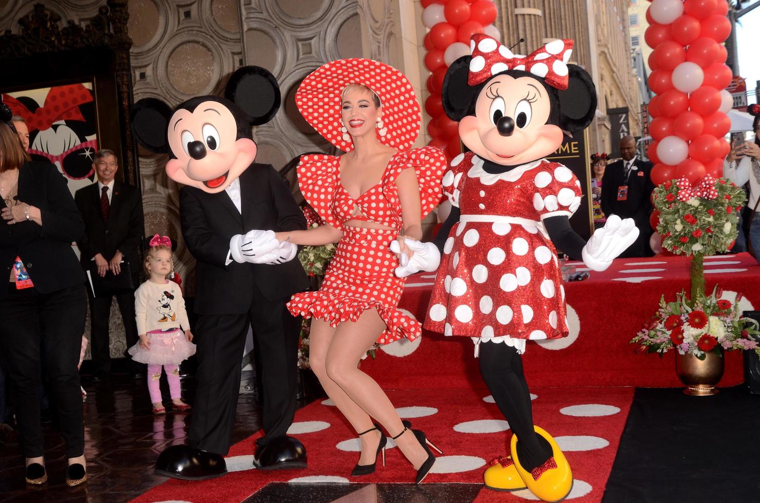 LOS ANGELES   JAN 22 - Mickey Mouse, Katy Perry, Minnie Mouse at the Minnie Mouse Star Ceremony on the Hollywood Walk of Fame on January 22, 2018 in Hollywood, CA photo