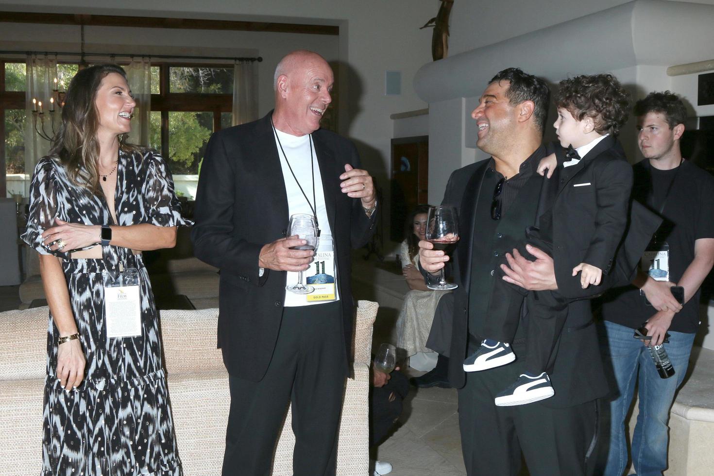 LOS ANGELES  SEP 25 - Ray McKewon, Kim McKewon, Ron Truppa, Ron Truppa III at the 2021 Catalina Film Festival  VIP Party at a Private Estate on September 25, 2021 in Avalon, CA photo