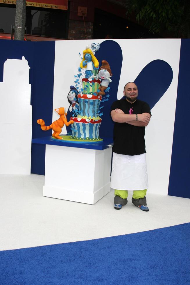 LOS ANGELES, JUL 28 - Duff Goldman with the Smurfs 2 cake by Charm City Cakes arrives at the Smurfs 2 Premiere at the Village Theater on July 28, 2013 in Westwood, CA photo