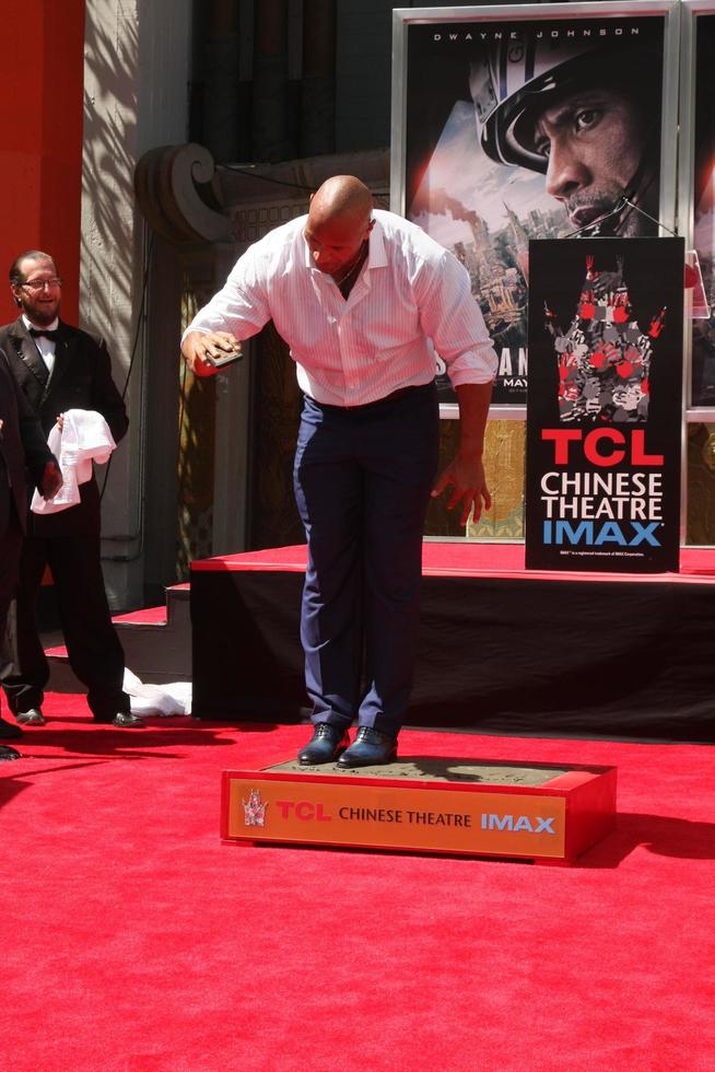 LOS ANGELES, MAY 19 - Dwayne Johnson, The Rock at the Dwayne Johnson Hand and Foot Print Ceremony at the TCL Chinese Theater on May 19, 2015 in Los Angeles, CA photo