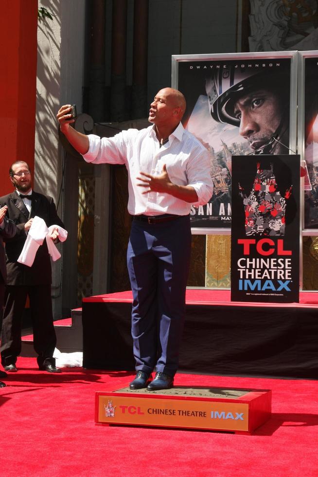 LOS ANGELES, MAY 19 - Dwayne Johnson, The Rock at the Dwayne Johnson Hand and Foot Print Ceremony at the TCL Chinese Theater on May 19, 2015 in Los Angeles, CA photo