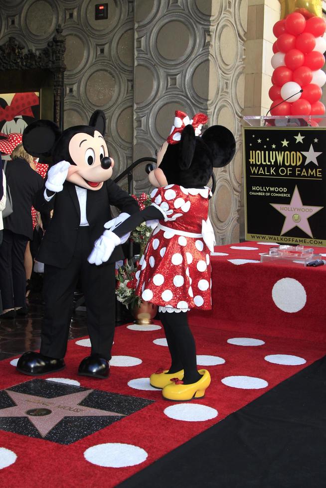 LOS ANGELES   JAN 22 - Mickey Mouse, Minnie Mouse at the Minnie Mouse Star Ceremony on the Hollywood Walk of Fame on January 22, 2018 in Hollywood, CA photo