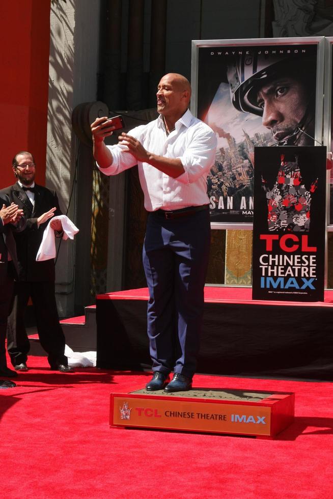 LOS ANGELES, MAY 19 - Dwayne Johnson, The Rock at the Dwayne Johnson Hand and Foot Print Ceremony at the TCL Chinese Theater on May 19, 2015 in Los Angeles, CA photo