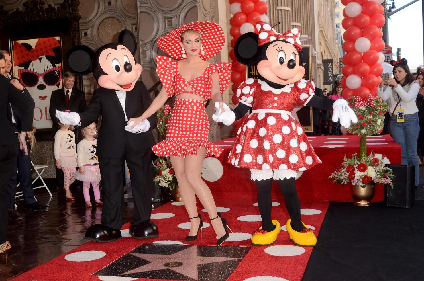 LOS ANGELES   JAN 22 - Mickey Mouse, Katy Perry, Minnie Mouse at the Minnie Mouse Star Ceremony on the Hollywood Walk of Fame on January 22, 2018 in Hollywood, CA photo