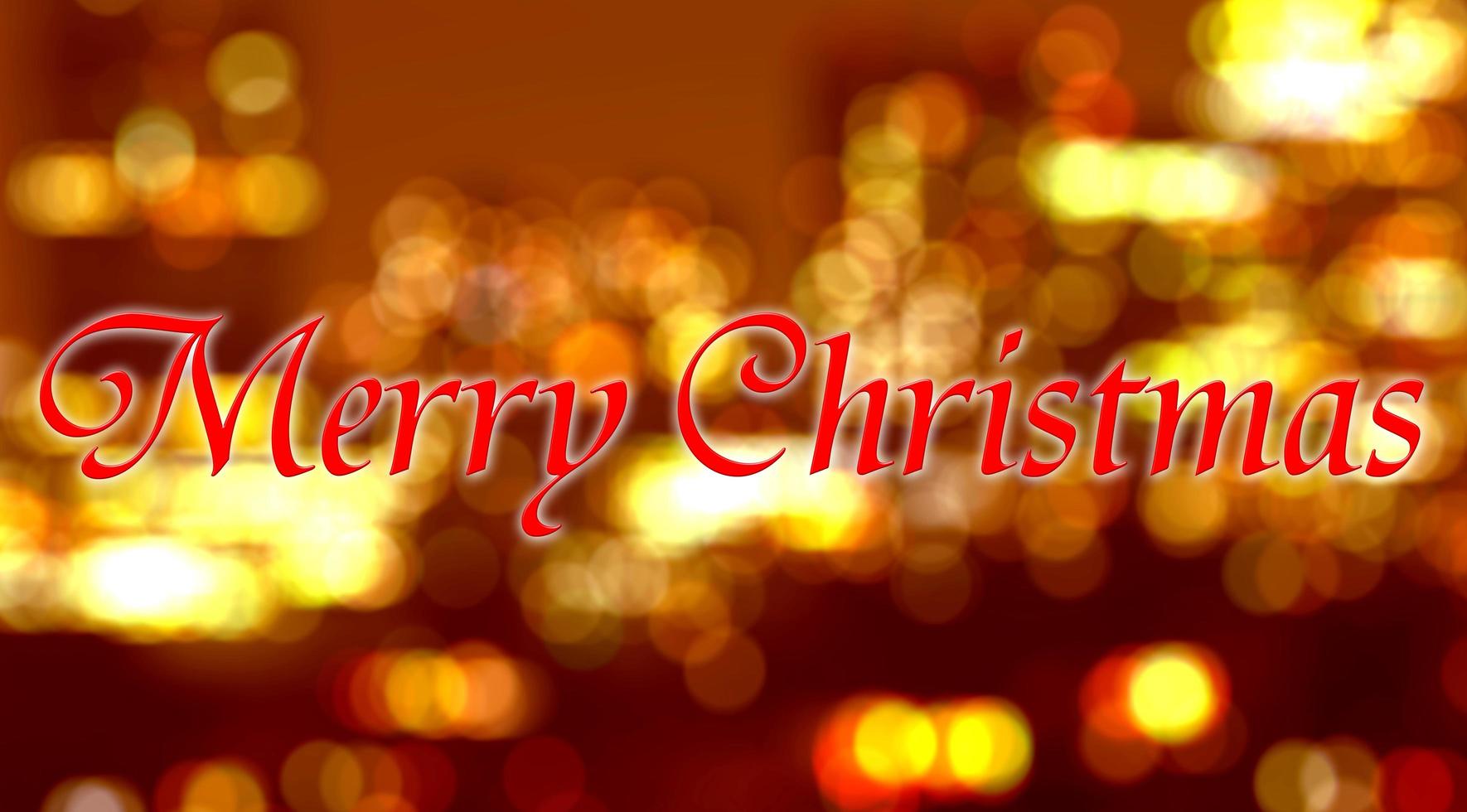 Merry Christmas written on blurred background photo