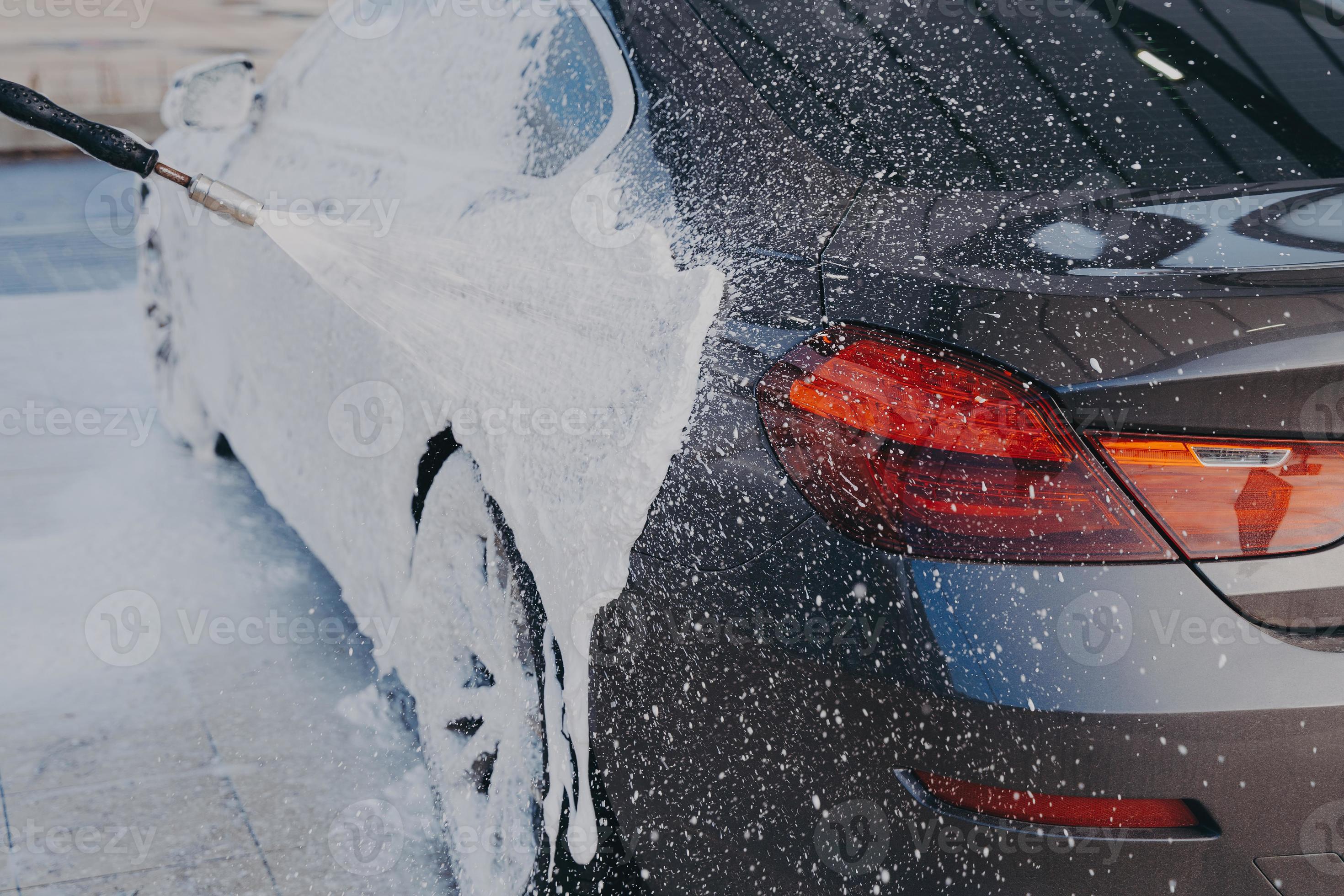 Car exterior cleaning, applying snow foam on dirty auto surface from  high-pressure washer 8241522 Stock Photo at Vecteezy