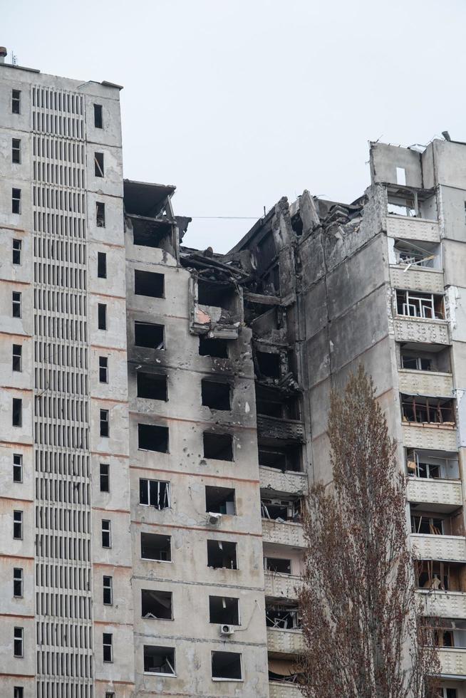 KHARKIV, UKRAINE - May, 04, 2022. War in Ukraine. Destroyed, bombed and burned residential building after Russian missiles in Kharkiv Ukraine. Russian aggression, conflict. Russian attack on Ukraine. photo