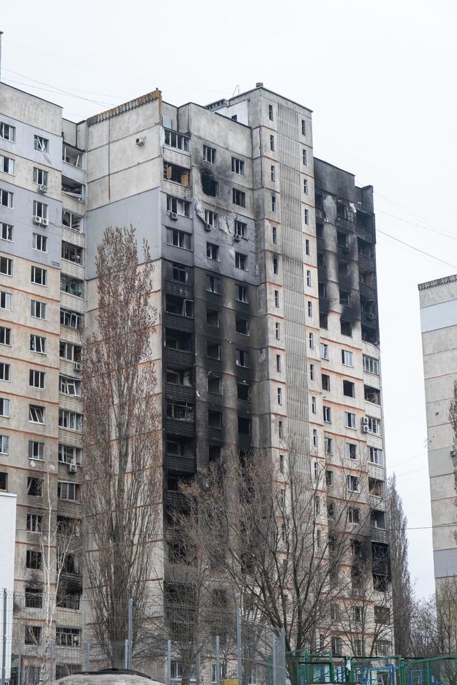 KHARKIV, UKRAINE - May, 04, 2022. War in Ukraine 2022. Destroyed, bombed and burned residential building after Russian missiles in Kharkiv Ukraine. Russian aggression. Russian attack on Ukraine. photo