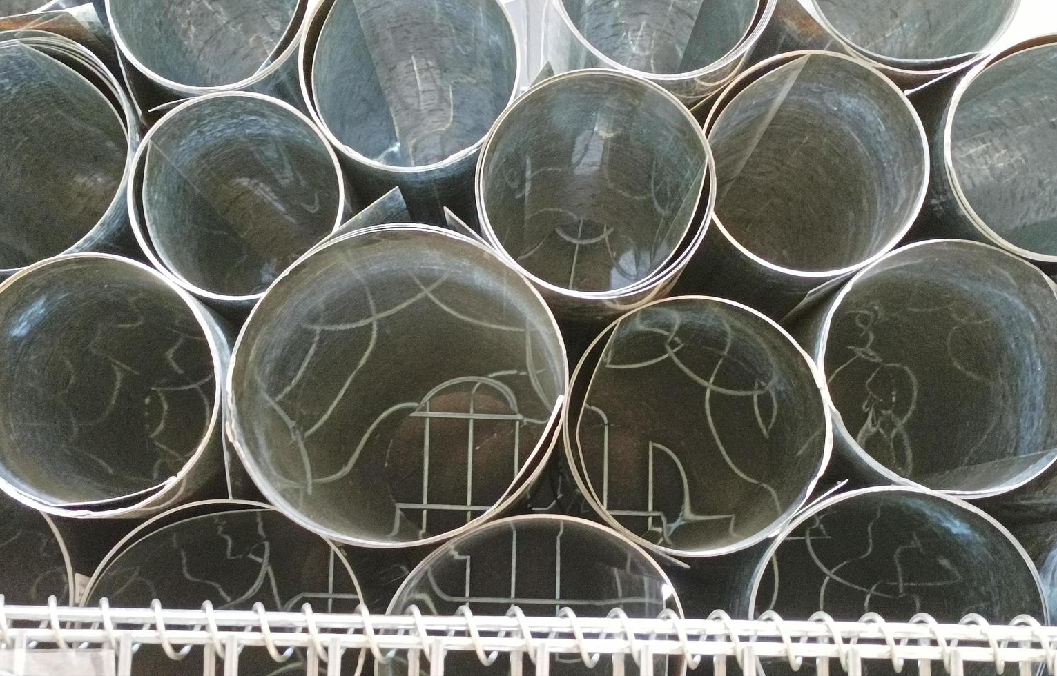 Rolls of flat galvanized metal sheets. photo