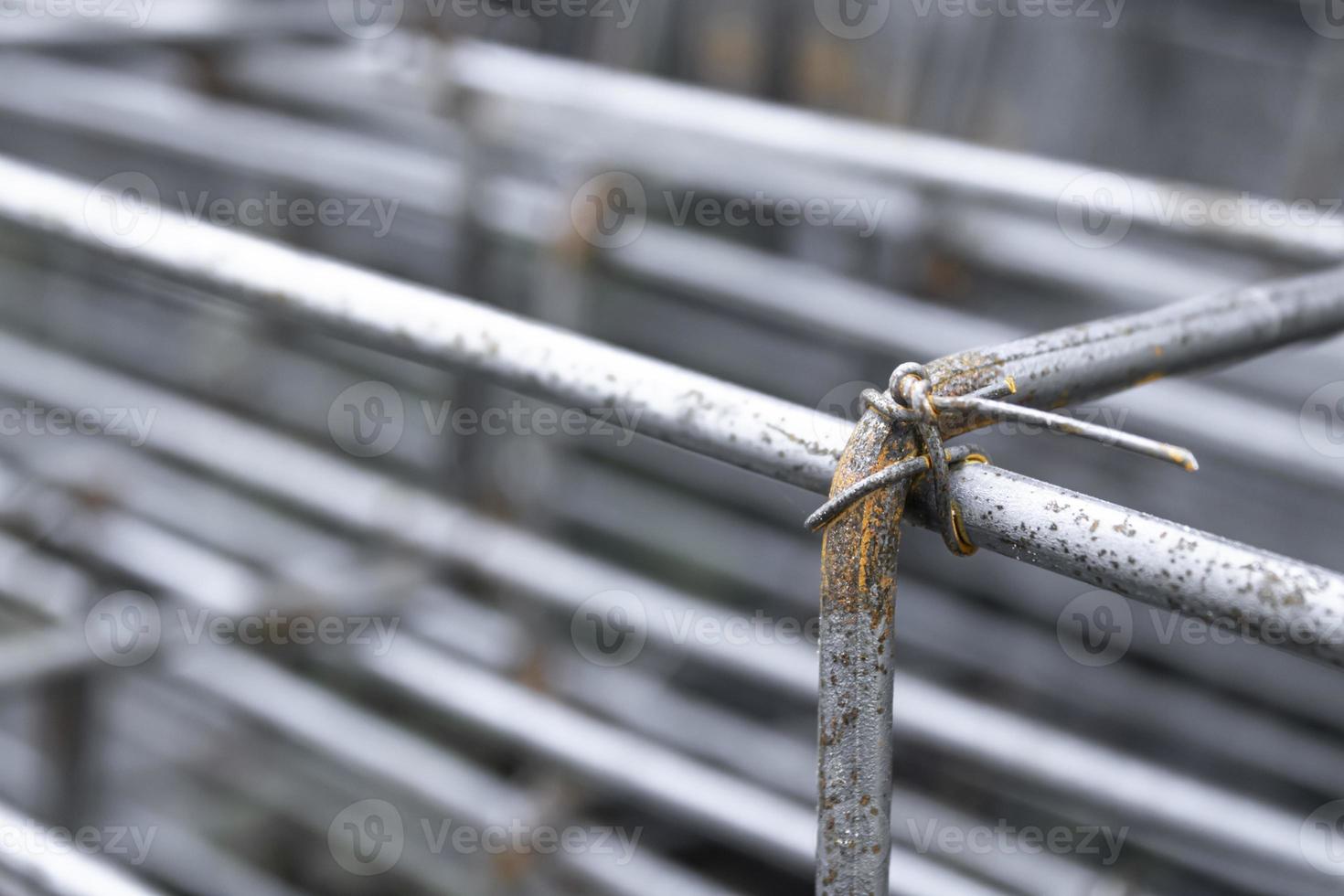 The steel that is bent and bundled into a steel frame is used for construction. photo