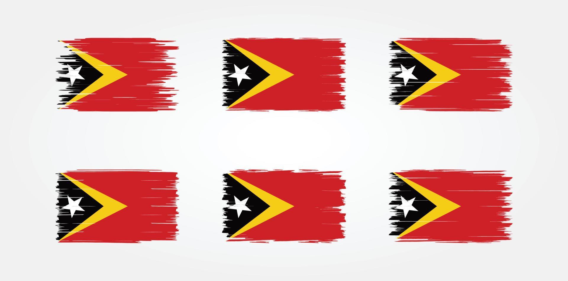 colección de pinceles de bandera de timor oriental. bandera nacional vector