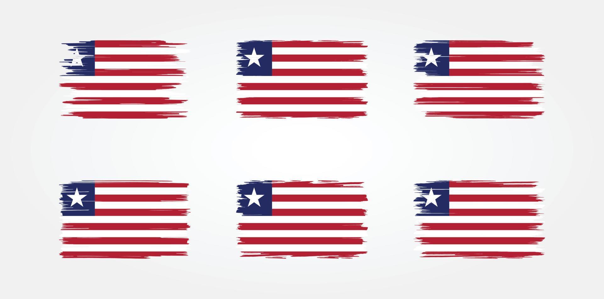 colección de pinceles de bandera de liberia. bandera nacional vector