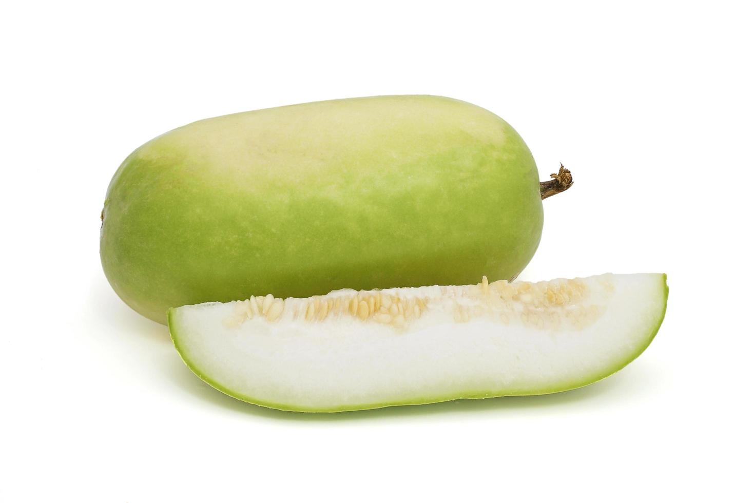 Sliced Winter melon isolated on a white background. White gourd, Winter gourd or Ash gourd. photo