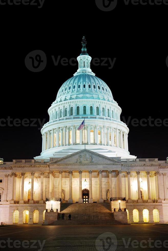 Capitol Hill Building illuminated at night, Washington DC photo