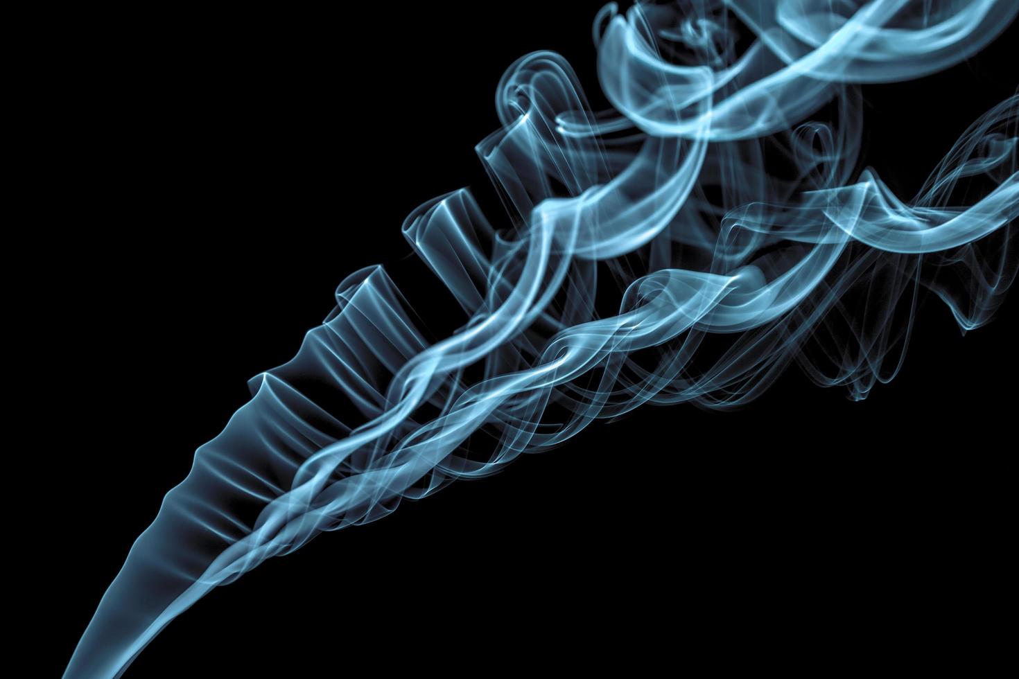 Incense stick smoke trail photo