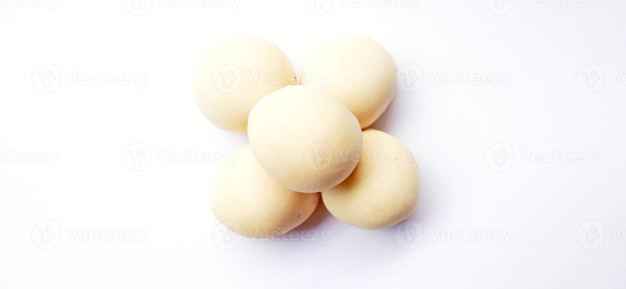 Delicious sweet round baked cake with negative space isolated on the gray white studio background. Food background design. Suitable for promotion of food and beverage industry and company. photo