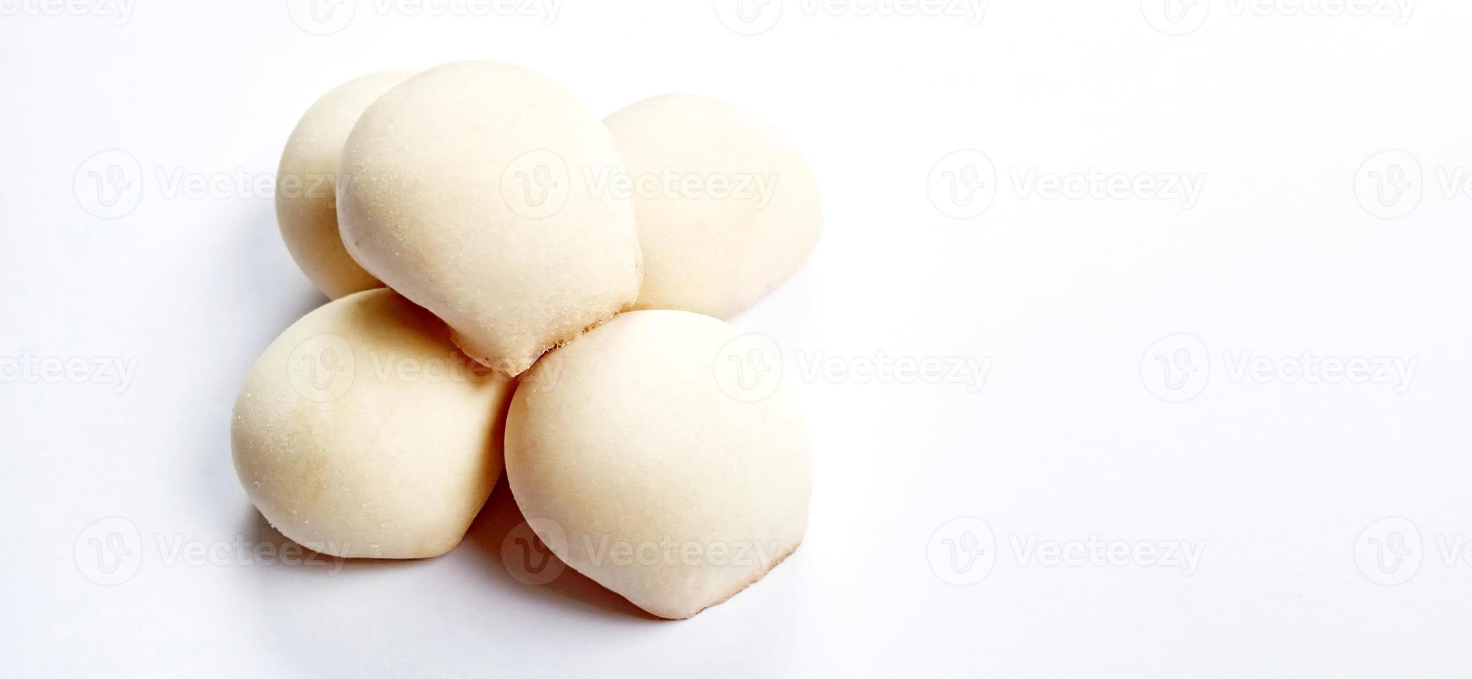 Delicious sweet round baked cake with negative space isolated on the gray white studio background. Food background design. Suitable for promotion of food and beverage industry and company. photo