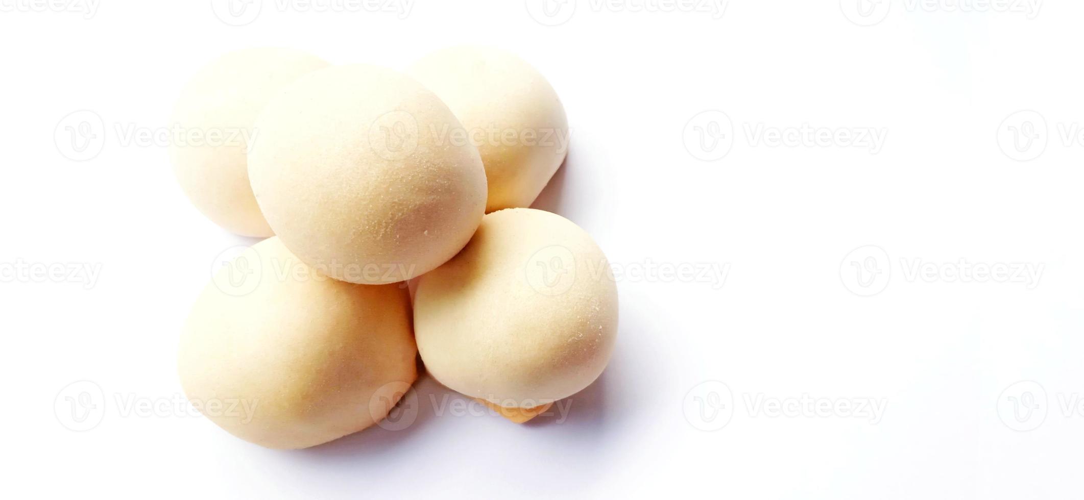 Delicious sweet round baked cake with negative space isolated on the gray white studio background. Food background design. Suitable for promotion of food and beverage industry and company. photo