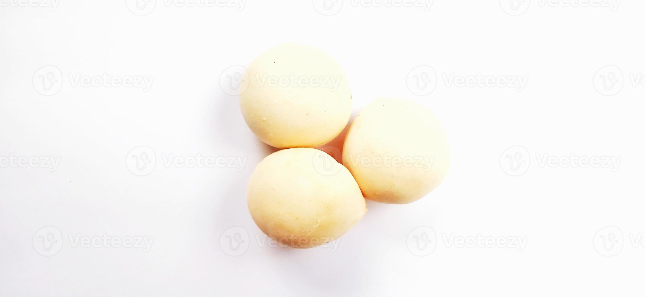 Delicious sweet round baked cake with negative space isolated on the gray white studio background. Food background design. Suitable for promotion of food and beverage industry and company. photo