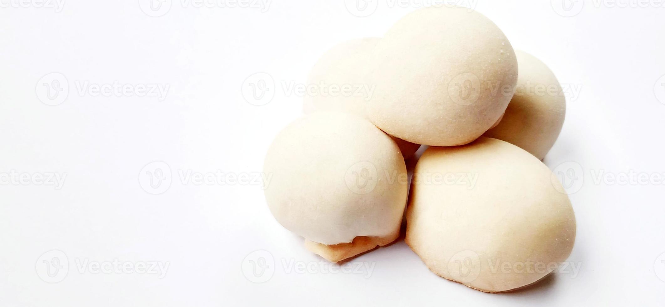 Delicious sweet round baked cake with negative space isolated on the gray white studio background. Food background design. Suitable for promotion of food and beverage industry and company. photo