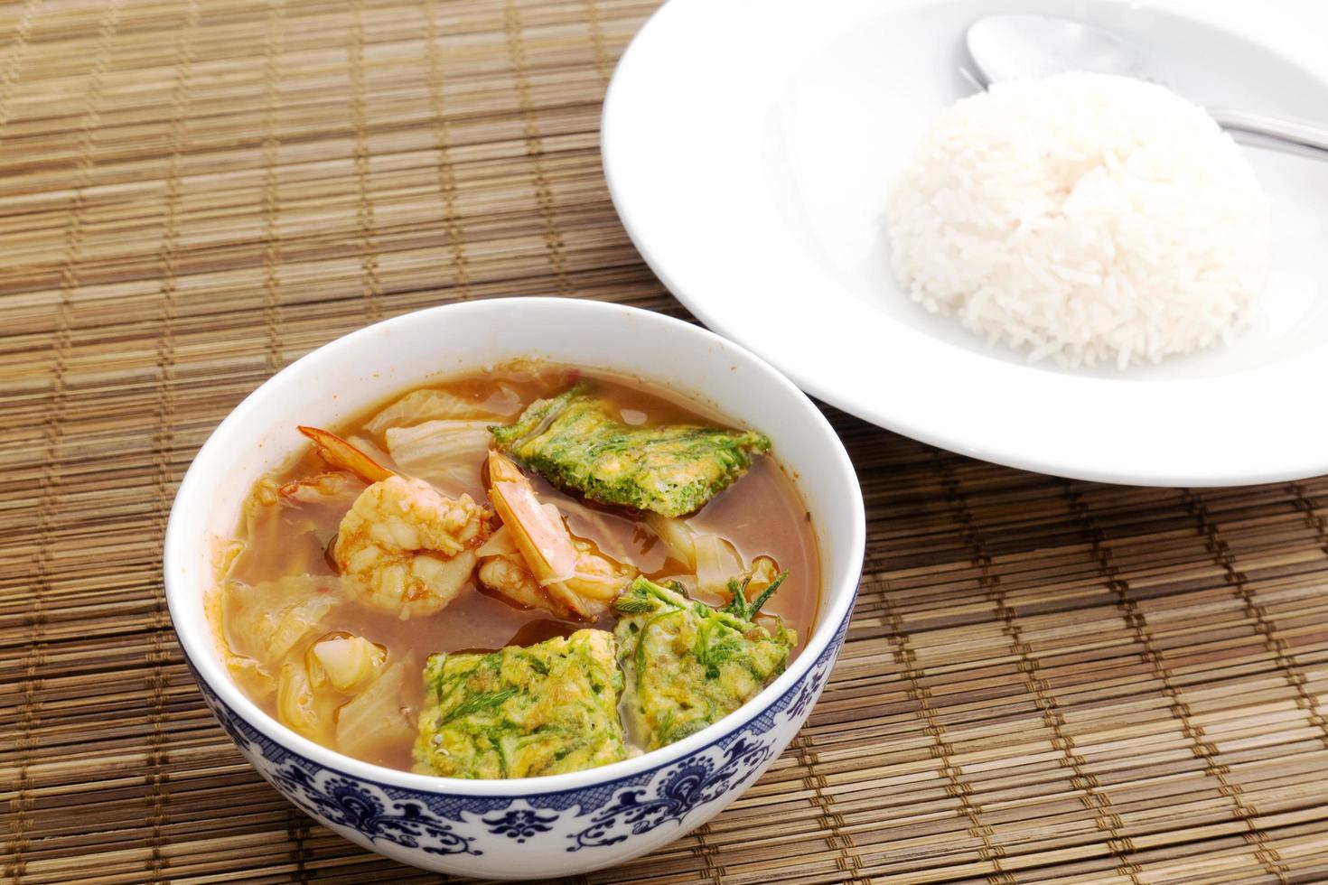 Hot and sour shrimp with vegetables of Thailand photo