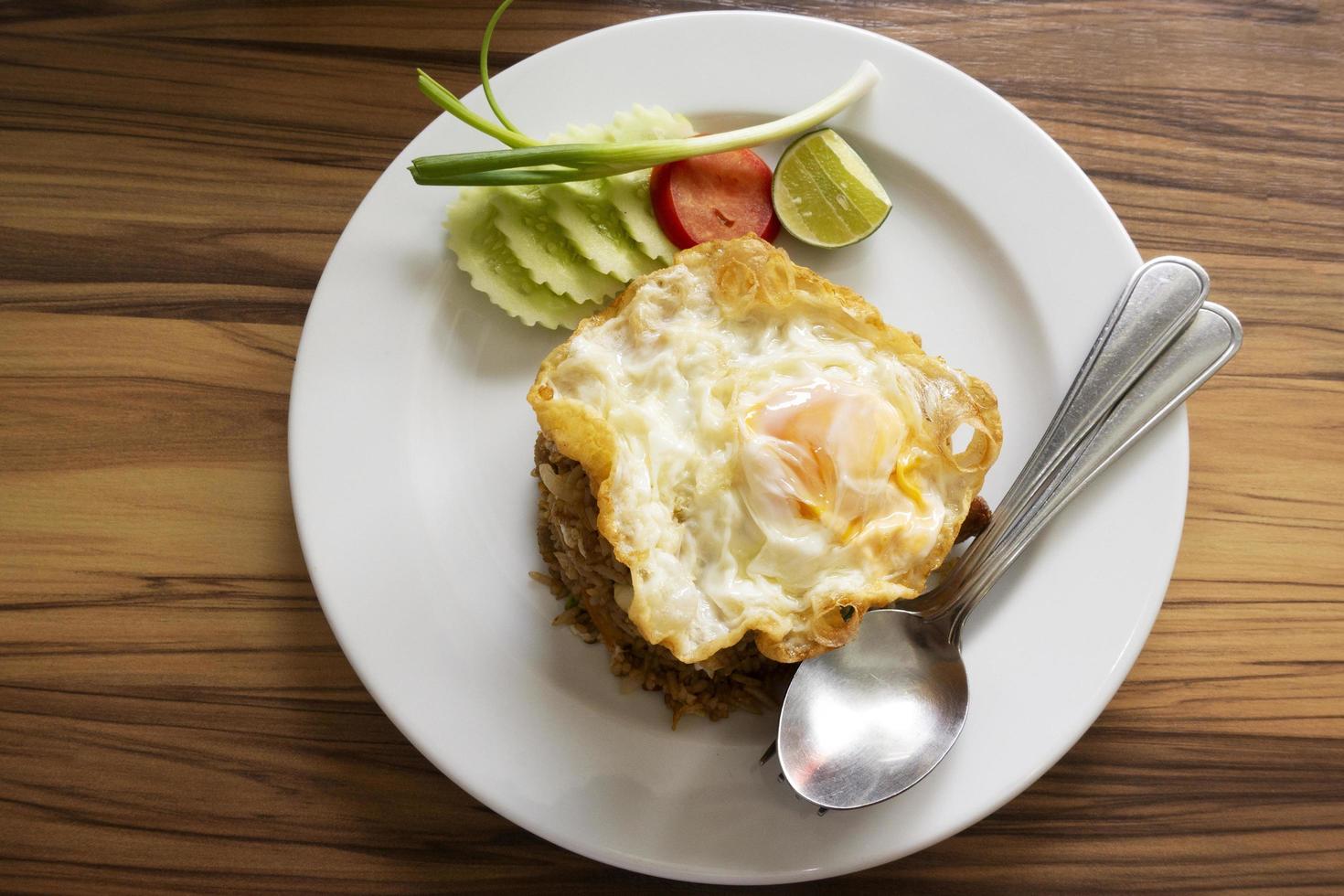 Fried rice with pork and fried eggs photo