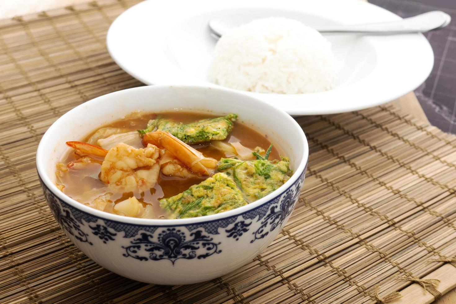 Hot and sour shrimp with vegetables of Thailand photo