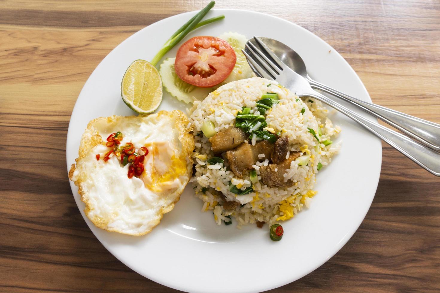 Pork fried rice with fried egg. photo