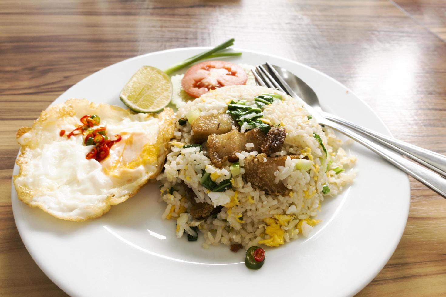 Pork fried rice with fried egg. photo